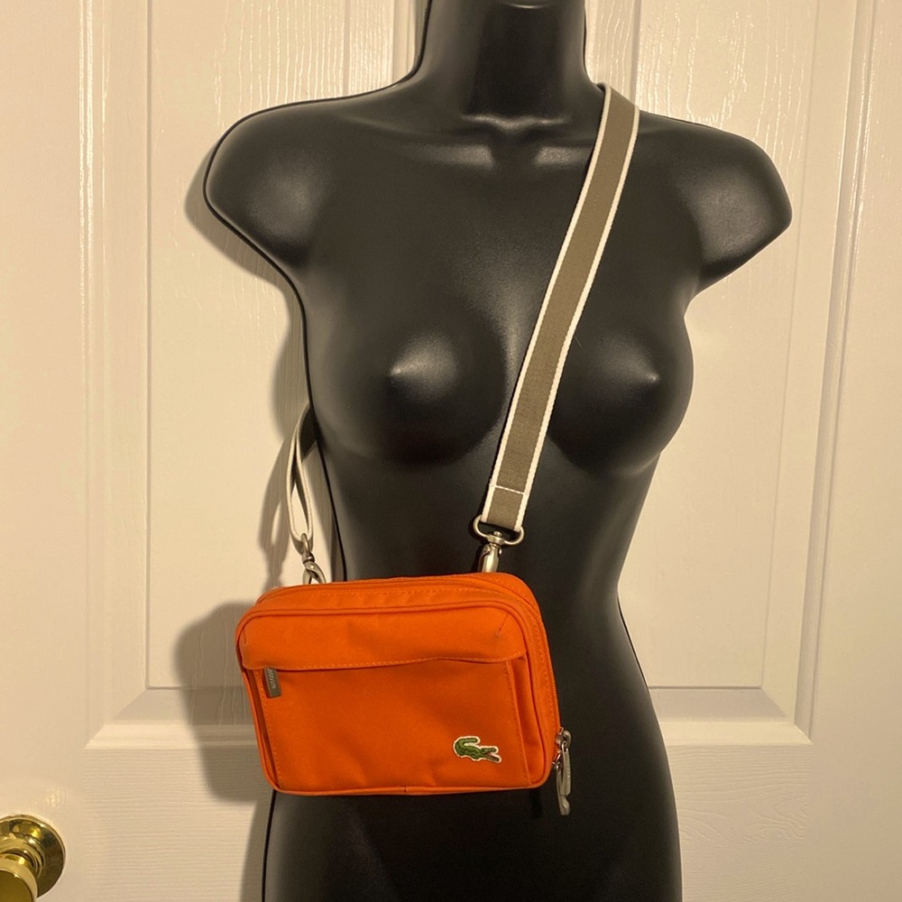 Lacoste nylon crossbody bag w/ removable adjustable strap.